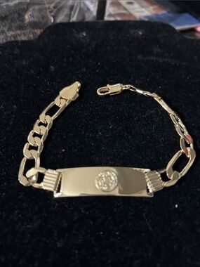 Gold ID Bracelet with Emblem